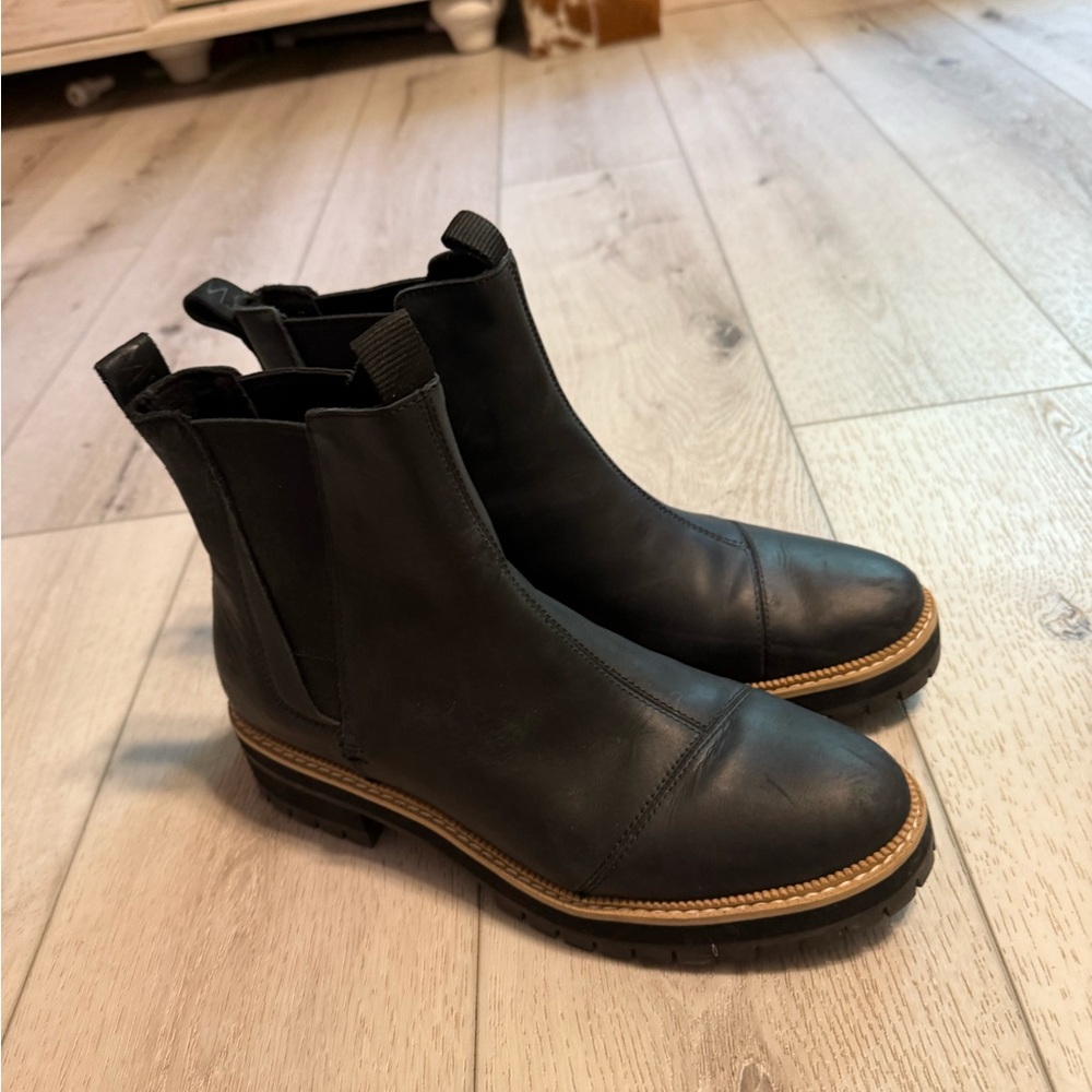 Toms Black Ankle Boots with Tan Sole.  Never worn